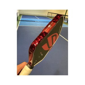 Image of the Vinyl Styles Edge Guard Ruby Carbon edge protector for pickleball paddles.